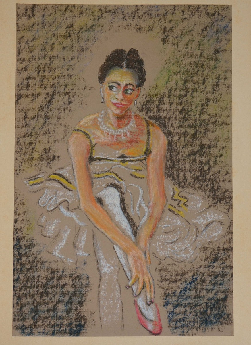 A seated dancer with tutu